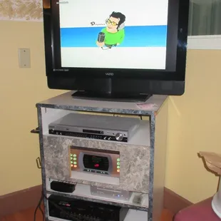 Our room&apos;s karaoke set up.