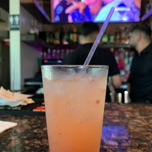 a drink in a tall glass