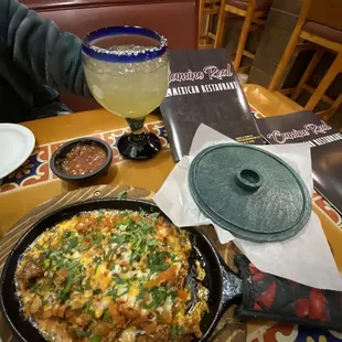 Queso Fundido! I ask them to load it up and hold the onions.