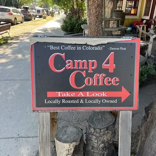 Sign on Main Street directing you one block down to coffee shop