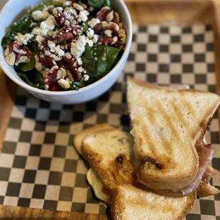 Fig and prosciutto panini with spinach salad