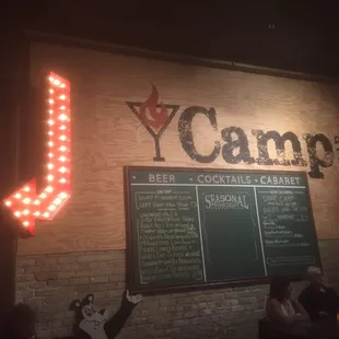 Looking for a place to see a show while you enjoy a cocktail? Follow the arrow.