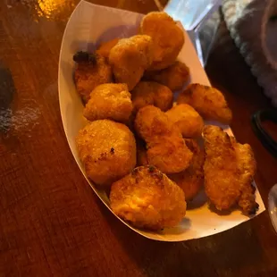 a basket of fried tater tots