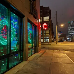 a christmas tree in the window