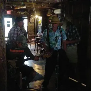 two men in a cabin at night