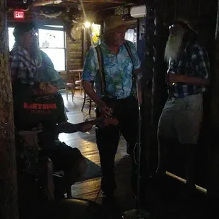 a group of men in a cabin