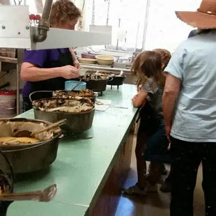 Young girls made dessert for lunch in Dutch ovens.. super yummy