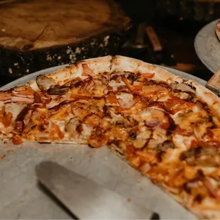 a slice missing from the pizza