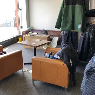 Comfy seating lounge area good for laptop work. Lots of tables available, too.