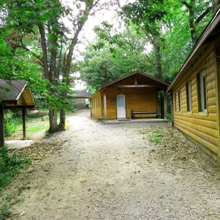 There are several cabins nestled in the forests.  Each can house up to 10 people. There is a modern bath house close by. (Forest Cabins)