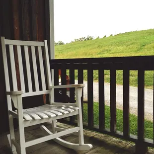 a rocking chair on a porch