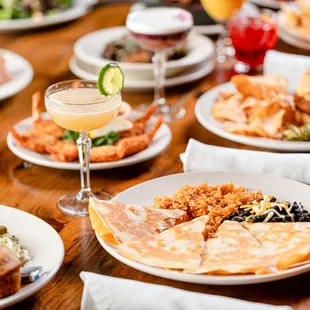 Quesadilla Grilled flour tortilla, chicken or beef, cheese and tomatoes. Served with black beans, Mexican rice, fresh salsa and sour cream.