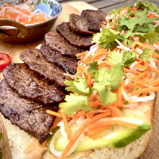 Angus filet Steak Banh Mi on fresh in house baked banquette