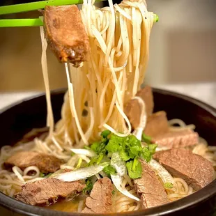 Juicy Succulent 8 hours slow cooked Angus Beef Brisket on 72 hours simmering flavorful Pho Bone Broth...