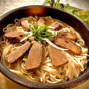 Luscious Tender 8 Hours Slow Cooked Briskets on 72 Hours Pho Bone Broth Large and full of Delicious Flavorful bone marrow + collagens