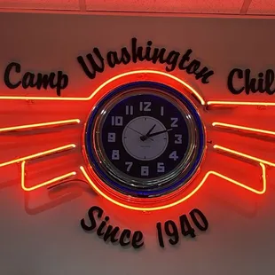 neon sign and clock