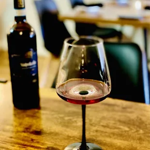 Excellent italian wine by the glass or bottle. (Valpolicella) OuiOui.