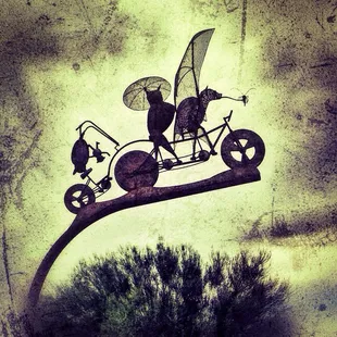 Bats and bikes sculpture at Campbell Ave and the Rillito River walk