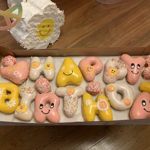 Smiley face/Flower Power birthday donuts