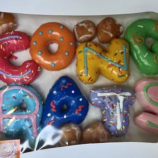 a variety of doughnuts in a box