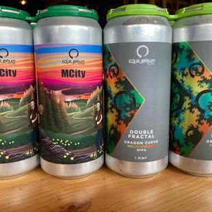 a row of cans of mcqv