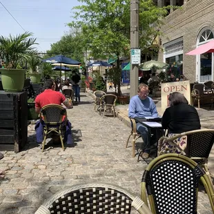 a group of people sitting outside