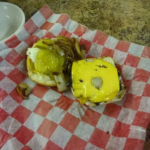 a sandwich with pickles and cheese