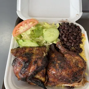 Rotisserie Chicken, rice and beans and salad.