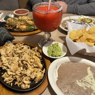 Chicken fajitas, Texana fajitas, strawberry daiquiri, guacamole, beans, chips &amp; salsa. All so good!!!
