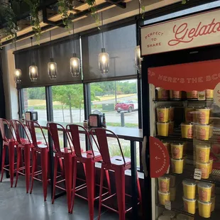 They have ice cream pints to go and bar top seating.