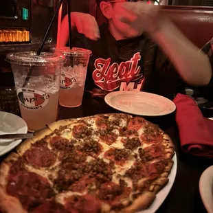 Pepperoni and Italian sausage pizza.