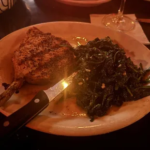Pork chop with garlic spinach