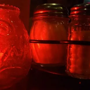 a candle and jars