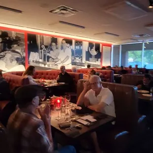 a group of people sitting at a table