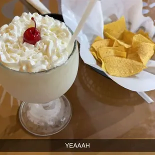 Piña colada with chips and salsa