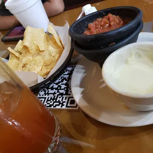 Michelada-amazing! Chips and salsa-great! Queso- rich in flavor....not cheese but real queso!