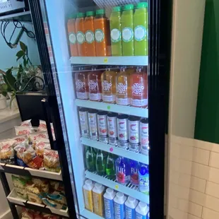 a refridgerator filled with drinks