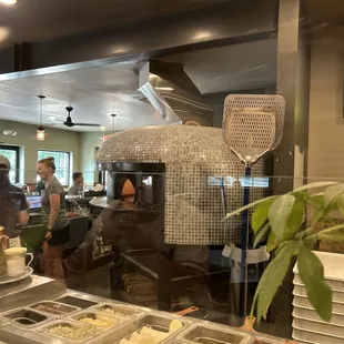 Inside with that beautiful custom pizza oven