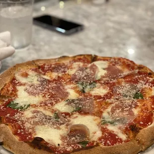 Margarita pizza with prosciutto added