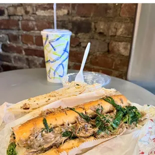 Roast pork sandwich with broccoli rabe.