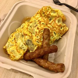 Ordered from Da Grill -- made my own omelet with ham, Portuguese &amp; link sausage, onion mushroom, and cheese