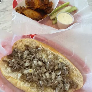 Cheesesteak and extra hot wings