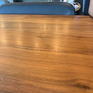 a wooden table and chairs