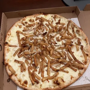 a pizza with a lot of toppings