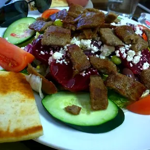 Fantastic Greek Gyro Salad we got a large for sharing Delicious  Pink dressing too Love