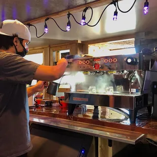 a bari preparing a drink