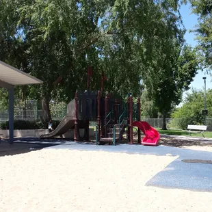 Area for smaller children, behind pond on opposite side of the rock/net area.