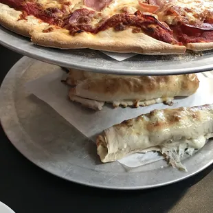 two pizzas on plates