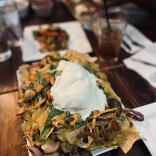 World Famous Campuzano Nachos with shrimp and fajita beef and chicken.