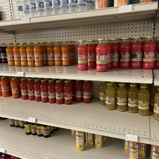 a shelf full of canned food